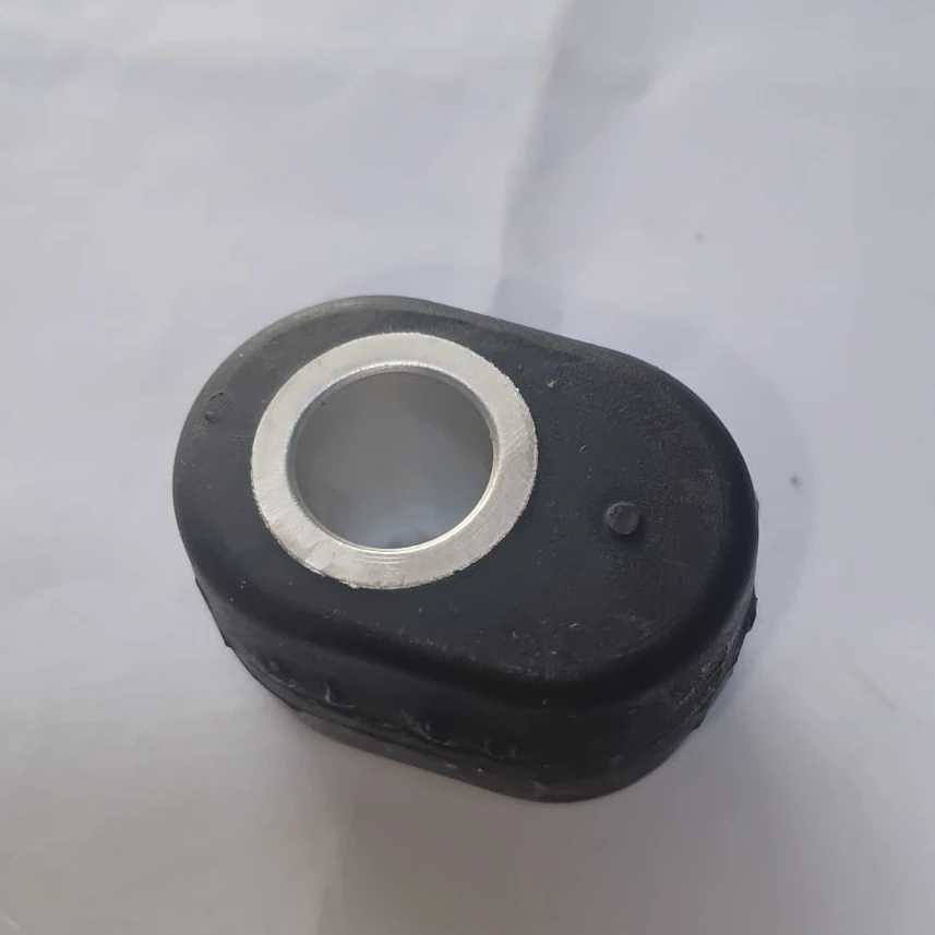 Elastomeric vibration-dampening spacer
